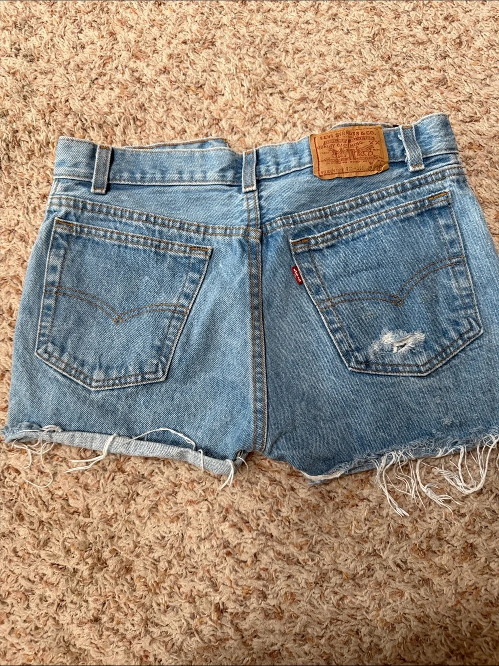 High-Rise Distressed Denim Cutoff Shorts - Light Blue